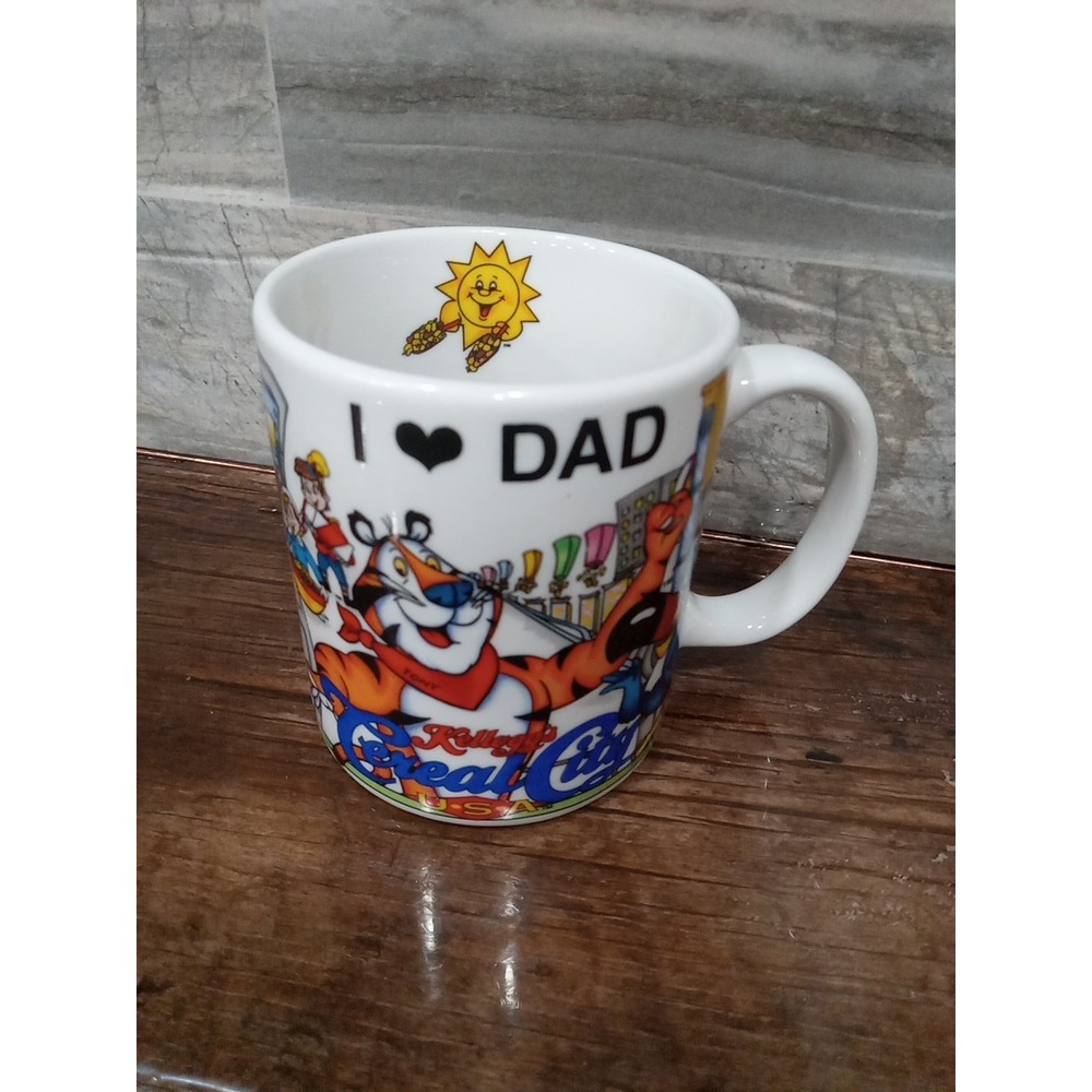 1998 Kellogg's Cereal City USA Ceramic Cup / Mug Tony The Tiger Toucan Sam Dad